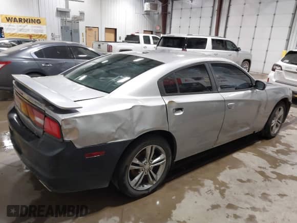 2013 Dodge Charger SXT с VIN 2C3CDXJG4DH731039, выставлен на аукционе IAAI как лот 43346477 с пробегом 144 918 миль миль и . История ставок и продаж доступна на DreamBid. Изображение 4.