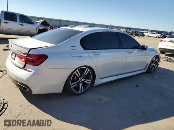 2017 BMW 7 Series with VIN WBA7H6C30HG614434, listed as a Copart auction lot 79236714 with Not provided miles and Clean title. Bid and sale history available at DreamBid. Image 3.