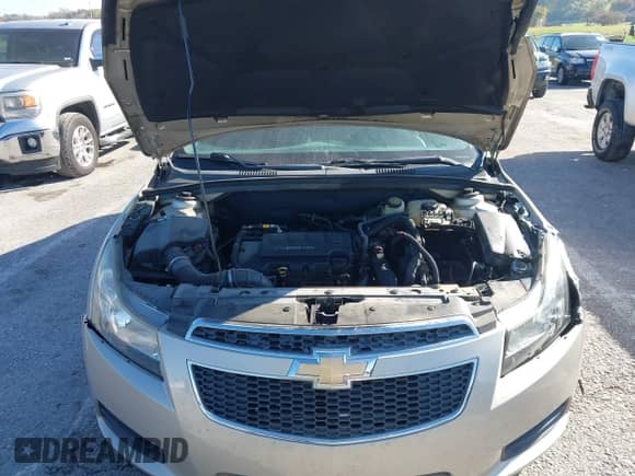 2014 Chevrolet Cruze 1LT z VIN 1G1PC5SB5E7341841, wystawiony jako IAAI lot #43574877 z przebiegiem 113 006 mil mil oraz . Historia ofert i sprzedaży dostępna na DreamBid. Obrazek 10.