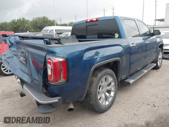 2018 GMC Sierra 1500 SLT z VIN 3GTP1NEC1JG227111, wystawiony jako IAAI lot #42477968 z przebiegiem 140 149 mil mil oraz . Historia ofert i sprzedaży dostępna na DreamBid. Obrazek 4.