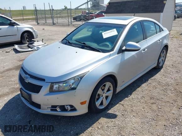 2014 Chevrolet Cruze 2LT с VIN 1G1PE5SB6E7110800, выставлен на аукционе IAAI как лот 43221056 с пробегом 77 100 миль миль и . История ставок и продаж доступна на DreamBid. Изображение 2.