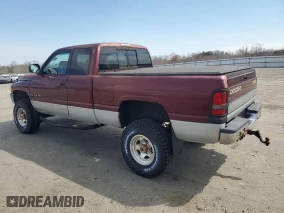 2000 Dodge 1500 with VIN 3B7HF12ZXYG129339, listed as a Copart auction lot 51156455 with 167,808 mi miles and Salvage title. Bid and sale history available at DreamBid. Image 2.