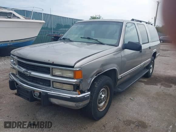 1999 Chevrolet Suburban with VIN 3GNGC26F0XG206137, listed as a IAAI auction lot 42559120 with Not provided miles and . Bid and sale history available at DreamBid. Image 2.