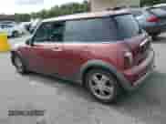2006 MINI Hardtop with VIN WMWRC33526TK66647, listed as a Copart auction lot 81100025 with 179,203 mi miles and Salvage title. Bid and sale history available at DreamBid. Image 2.