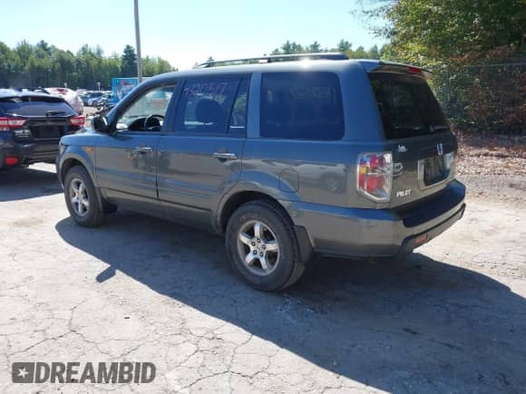 2007 Honda Pilot EX with VIN 2HKYF184X7H500209, listed as a IAAI auction lot 43201517 with 77,309 mi miles and . Bid and sale history available at DreamBid. Image 3.