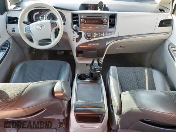 2014 Toyota Sienna SE with VIN 5TDXK3DC1ES454342, listed as a Copart auction lot 71318245 with 115,365 mi miles and Salvage title. Bid and sale history available at DreamBid. Image 8.