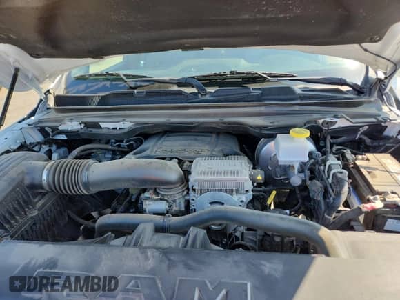 2023 Ram 1500 Big Horn with VIN 1C6SRFMT1PN628076, listed as a Copart auction lot 71742945 with 76,500 mi miles and Salvage title. Bid and sale history available at DreamBid. Image 11.