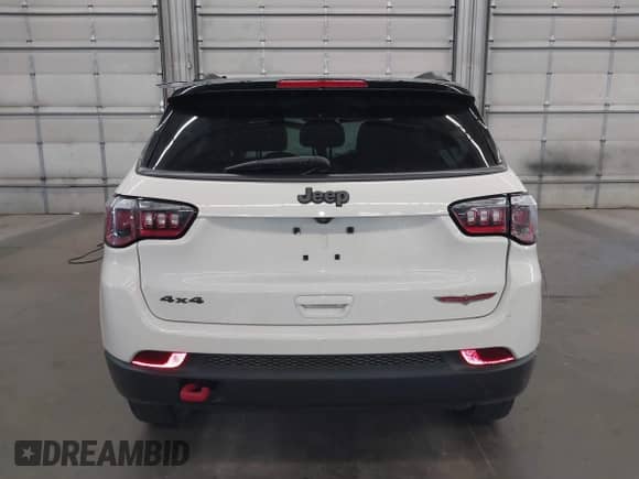2019 Jeep Compass Trailhawk z VIN 3C4NJDDB5KT813801, wystawiony jako IAAI lot #43041716 z przebiegiem 84 418 mil mil oraz . Historia ofert i sprzedaży dostępna na DreamBid. Obrazek 16.