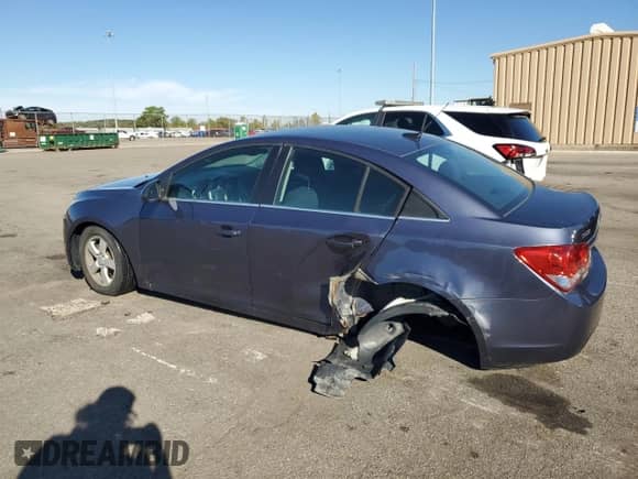 2014 Chevrolet Cruze 1LT z VIN 1G1PC5SB8E7337539, wystawiony jako Copart lot #82408735 z przebiegiem 124 655 mil mil oraz Szkoda całkowita • Salvage title. Historia ofert i sprzedaży dostępna na DreamBid. Obrazek 2.