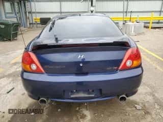 2003 Hyundai Tiburon GT с VIN KMHHN65F73U018847, выставлен на аукционе Copart как лот 58242385 с пробегом 164 976 миль миль и Списание • Salvage title. История ставок и продаж доступна на DreamBid. Изображение 6.