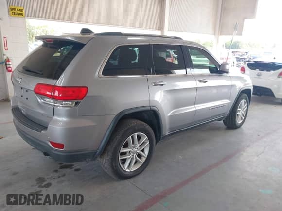 2018 Jeep Grand Cherokee Altitude with VIN 1C4RJFAG4JC258508, listed as a IAAI auction lot 43088370 with 91,944 mi miles and . Bid and sale history available at DreamBid. Image 4.
