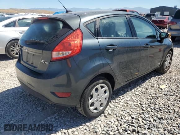 2011 Ford Fiesta SE z VIN 3FADP4EJXBM196640, wystawiony jako Copart lot #64479785 z przebiegiem 125 473 mil mil oraz Szkoda całkowita • Salvage title. Historia ofert i sprzedaży dostępna na DreamBid. Obrazek 3.