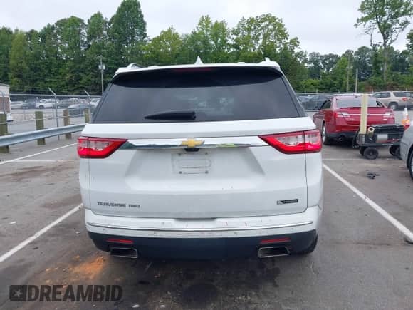2018 Chevrolet Traverse Premier with VIN 1GNEVJKW7JJ218518, listed as a IAAI auction lot 42876202 with 105,178 mi miles and . Bid and sale history available at DreamBid. Image 16.