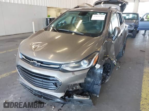 2021 Chevrolet Trax LT z VIN KL7CJLSB8MB358688, wystawiony jako IAAI lot #43028764 z przebiegiem 26 445 mil mil oraz . Historia ofert i sprzedaży dostępna na DreamBid. Obrazek 6.