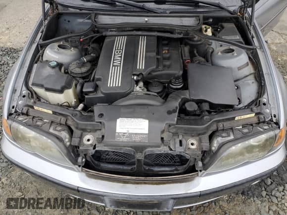 2004 BMW 3 Series 325i with VIN WBAAZ33474KP82704, listed as a Copart auction lot 90720105 with 122,580 mi miles and Clean title. Bid and sale history available at DreamBid. Image 11.