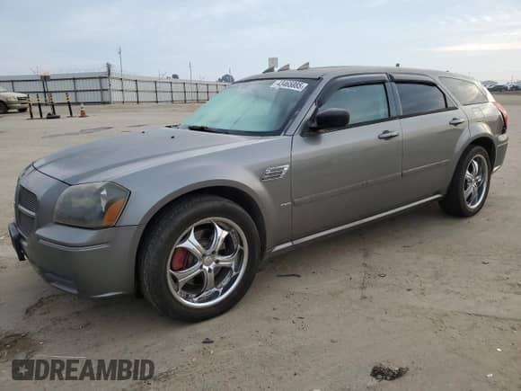 2005 Dodge Magnum SXT with VIN 2D4GZ48V75H557876, listed as a Copart auction lot 43465085 with 191,632 mi miles and Salvage title. Bid and sale history available at DreamBid. Image 1.