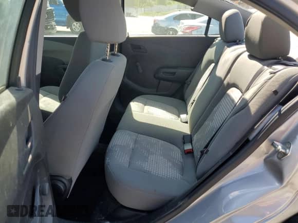 2018 Chevrolet Sonic LS с VIN 1G1JB5SHXJ4136217, выставлен на аукционе Copart как лот 52906665 с пробегом 61 514 миль миль и Списание • Salvage title. История ставок и продаж доступна на DreamBid. Изображение 10.