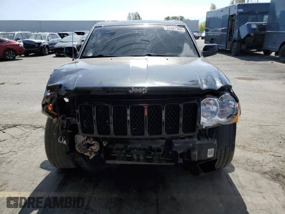 2008 Jeep Grand Cherokee SRT-8 with VIN 1J8HR78378C237426, listed as a Copart auction lot 53487965 with 114,500 mi miles and Salvage title. Bid and sale history available at DreamBid. Image 5.