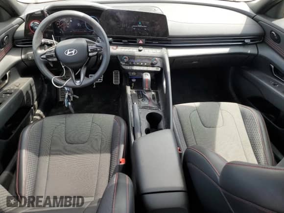 2025 Hyundai Elantra N Line z VIN KMHLR4DF0SU935096, wystawiony jako Copart lot #64205195 z przebiegiem 4 222 mil mil oraz Szkoda całkowita • Salvage title. Historia ofert i sprzedaży dostępna na DreamBid. Obrazek 8.