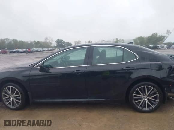 2023 Toyota Camry Hybrid XLE with VIN 4T1F31AK7PU602464, listed as a IAAI auction lot 43392293 with 41,716 mi miles and . Bid and sale history available at DreamBid. Image 14.