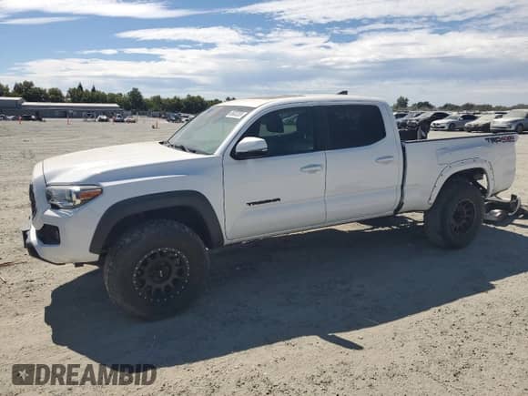 2019 Toyota Tacoma SR5 с VIN 3TMDZ5BN6KM058580, выставлен на аукционе Copart как лот 65633265 с пробегом 30 232 миль миль и Списание • Salvage title. История ставок и продаж доступна на DreamBid. Изображение 1.