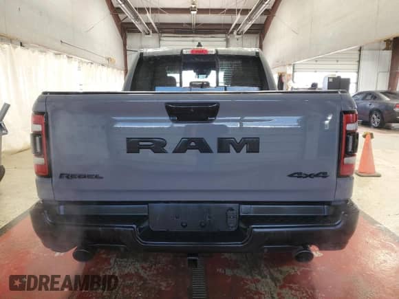 2023 Ram 1500 Rebel z VIN 1C6SRFLT7PN670947, wystawiony jako Copart lot #71454064 z przebiegiem 17 100 mil mil oraz Szkoda całkowita • Salvage title. Historia ofert i sprzedaży dostępna na DreamBid. Obrazek 6.