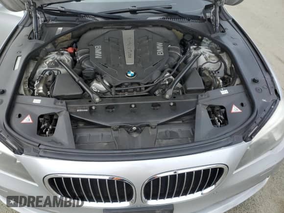 2013 BMW 7 Series 750i с VIN WBAYA8C57DC996498, выставлен на аукционе Copart как лот 52907415 с пробегом 109 405 миль миль и Списание • Salvage title. История ставок и продаж доступна на DreamBid. Изображение 11.