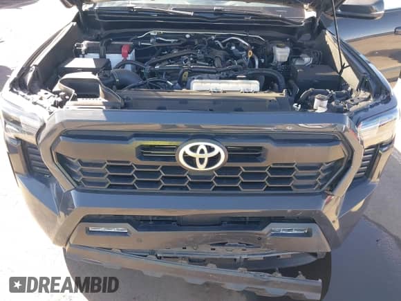 2024 Toyota Tacoma SR5 with VIN 3TMLB5FN8RM005075, listed as a IAAI auction lot 43290415 with 20,318 mi miles and . Bid and sale history available at DreamBid. Image 10.