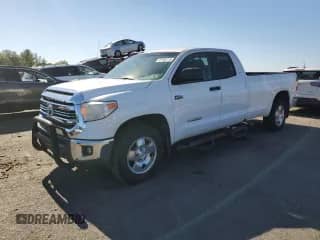 2016 Toyota Tundra SR with VIN 5TFCY5F1XGX020292, listed as a Copart auction lot 87105715 with 121,822 mi miles and Salvage title. Bid and sale history available at DreamBid. Image 1.
