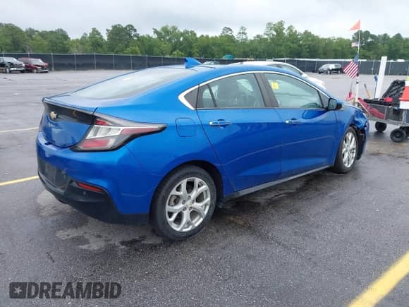 2016 Chevrolet Volt Premier with VIN 1G1RD6S52GU129196, listed as a IAAI auction lot 42400786 with 79,609 mi miles and . Bid and sale history available at DreamBid. Image 4.