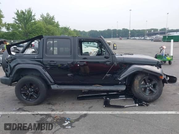 2021 Jeep Wrangler Unlimited Sahara High Altitude with VIN 1C4HJXEN6MW628841, listed as a IAAI auction lot 42915446 with 34,252 mi miles and . Bid and sale history available at DreamBid. Image 14.