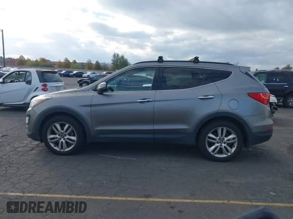 2013 Hyundai Santa Fe Sport z VIN 5XYZUDLAXDG039119, wystawiony jako IAAI lot #43524581 z przebiegiem 331 501 mil mil oraz . Historia ofert i sprzedaży dostępna na DreamBid. Obrazek 14.