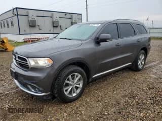 2015 Dodge Durango Limited with VIN 1C4RDJDG4FC770489, listed as a Copart auction lot 64330175 with 150,419 mi miles and Salvage title. Bid and sale history available at DreamBid. Image 1.