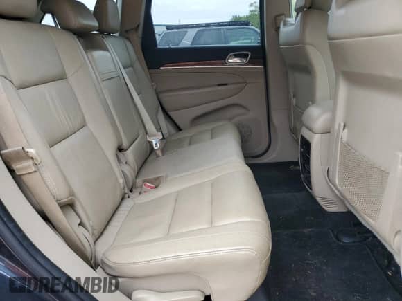 2012 Jeep Grand Cherokee Limited z VIN 1C4RJFBG8CC300891, wystawiony jako Copart lot #84041155 z przebiegiem 141 239 mil mil oraz Czysty tytuł • Clean title. Historia ofert i sprzedaży dostępna na DreamBid. Obrazek 11.