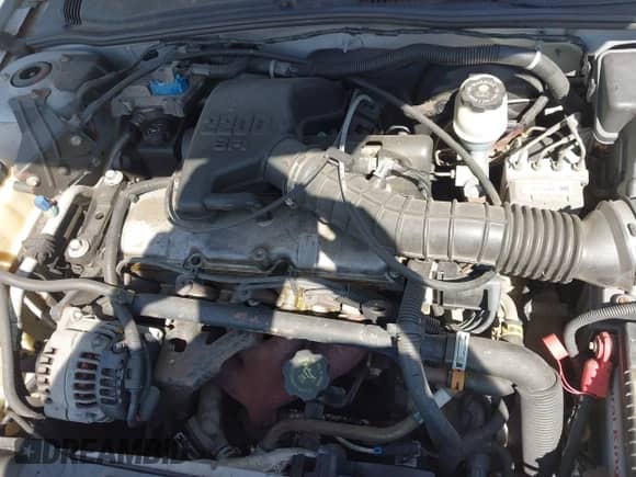 2002 Chevrolet Cavalier z VIN 1G1JC524X27206678, wystawiony jako IAAI lot #43106115 z przebiegiem Nie podano mil oraz . Historia ofert i sprzedaży dostępna na DreamBid. Obrazek 10.