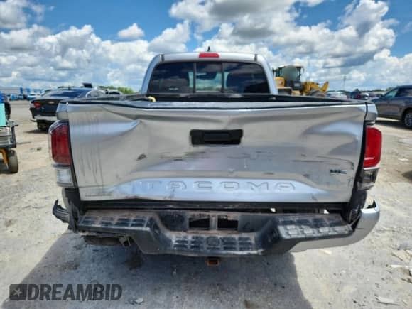 2022 Toyota Tacoma SR z VIN 3TYSZ5AN6NT091760, wystawiony jako Copart lot #63561745 z przebiegiem 61 005 mil mil oraz Szkoda całkowita • Salvage title. Historia ofert i sprzedaży dostępna na DreamBid. Obrazek 6.