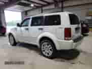 2011 Dodge Nitro Heat with VIN 1D4PU4GX7BW607335, listed as a Copart auction lot 59881235 with 152,891 mi miles and Salvage title. Bid and sale history available at DreamBid. Image 2.