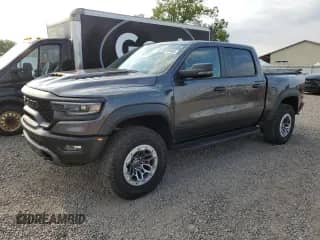 2024 Ram 1500 TRX z VIN 1C6SRFU91RN141399, wystawiony jako Copart lot #65735065 z przebiegiem 19 660 mil mil oraz Szkoda całkowita • Salvage title. Historia ofert i sprzedaży dostępna na DreamBid. Obrazek 1.