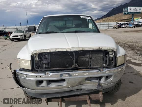 1998 Dodge 2500 with VIN 1B7KF2367WJ176999, listed as a Copart auction lot 81854595 with Not provided miles and Salvage title. Bid and sale history available at DreamBid. Image 5.