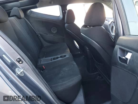 2012 Hyundai Veloster w/Black Int z VIN KMHTC6AD0CU023084, wystawiony jako Copart lot #82597005 z przebiegiem 187 990 mil mil oraz Czysty tytuł • Clean title. Historia ofert i sprzedaży dostępna na DreamBid. Obrazek 10.