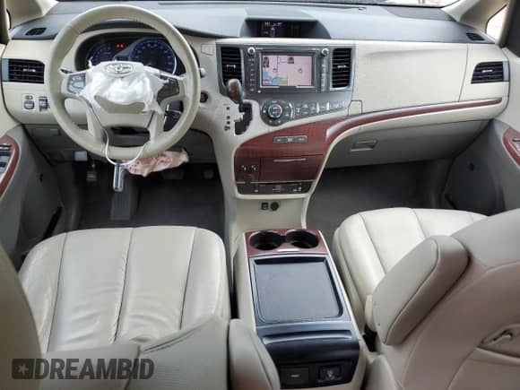 2011 Toyota Sienna XLE AAS with VIN 5TDYK3DC5BS050220, listed as a Copart auction lot 69008955 with 150,197 mi miles and Salvage title. Bid and sale history available at DreamBid. Image 8.