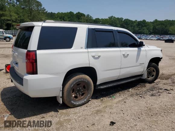 2015 Chevrolet Tahoe LT с VIN 1GNSCBKC9FR216525, выставлен на аукционе Copart как лот 55747815 с пробегом 213 112 миль миль и Списание • Salvage title. История ставок и продаж доступна на DreamBid. Изображение 3.