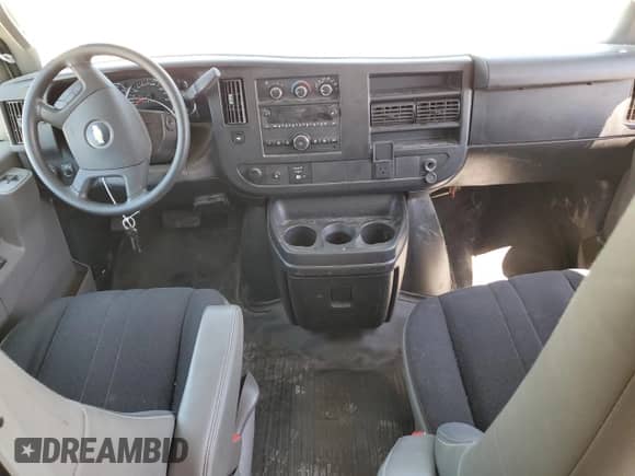 2018 Chevrolet Express Cargo с VIN 1GCWGAFG4J1906387, выставлен на аукционе Copart как лот 64312715 с пробегом 56 836 миль миль и Списание • Salvage title. История ставок и продаж доступна на DreamBid. Изображение 8.