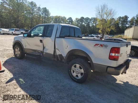 2005 Ford F-150 XLT with VIN 1FTPX14525NB67394, listed as a Copart auction lot 85132755 with 140,503 mi miles and Salvage title. Bid and sale history available at DreamBid. Image 2.