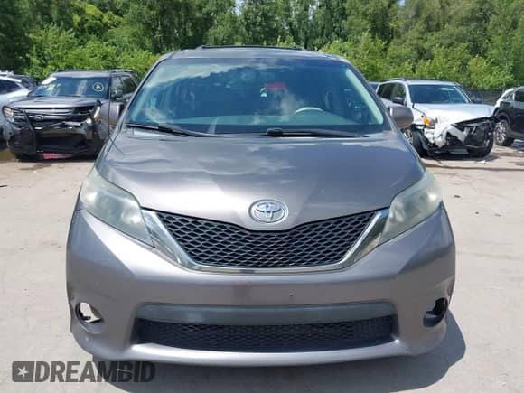 2014 Toyota Sienna SE with VIN 5TDXK3DC8ES443113, listed as a IAAI auction lot 42735795 with 235,269 mi miles and . Bid and sale history available at DreamBid. Image 13.