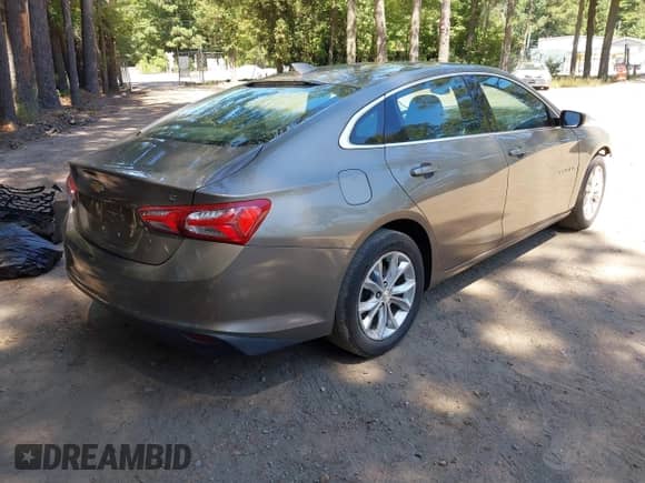 2020 Chevrolet Malibu LT with VIN 1G1ZD5STXLF046638, listed as a IAAI auction lot 43061355 with 93,350 mi miles and . Bid and sale history available at DreamBid. Image 4.