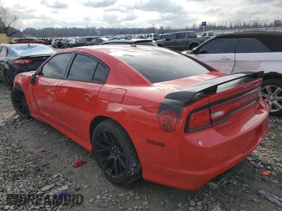 2013 Dodge Charger SRT-8 Super Bee with VIN 2C3CDXGJ2DH716655, listed as a Copart auction lot 83453814 with 108,033 mi miles and Salvage title. Bid and sale history available at DreamBid. Image 2.