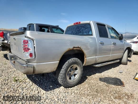 2006 Dodge 1500 ST with VIN 1D7HA18K36J161737, listed as a Copart auction lot 63830125 with 227,282 mi miles and Salvage title. Bid and sale history available at DreamBid. Image 3.