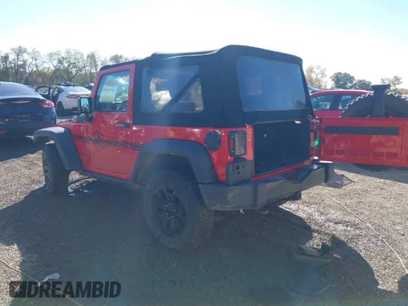 2015 Jeep Wrangler Sport with VIN 1C4AJWAG3FL606500, listed as a IAAI auction lot 40596072 with 110,344 mi miles and . Bid and sale history available at DreamBid. Image 3.