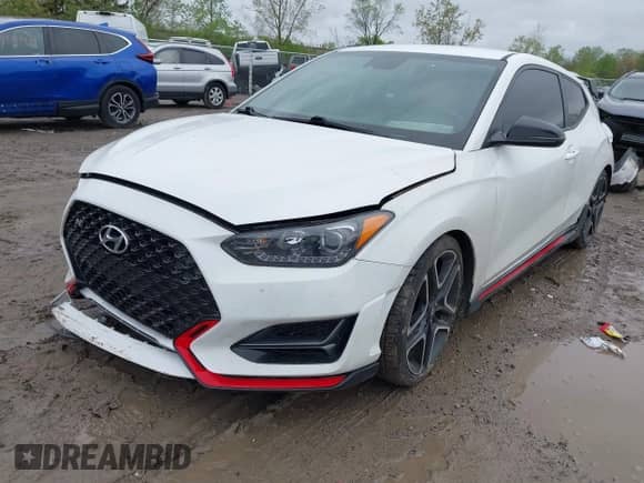 2021 Hyundai Veloster z VIN KMHT36AH3MU009877, wystawiony jako IAAI lot #42209546 z przebiegiem Nie podano mil oraz . Historia ofert i sprzedaży dostępna na DreamBid. Obrazek 2.